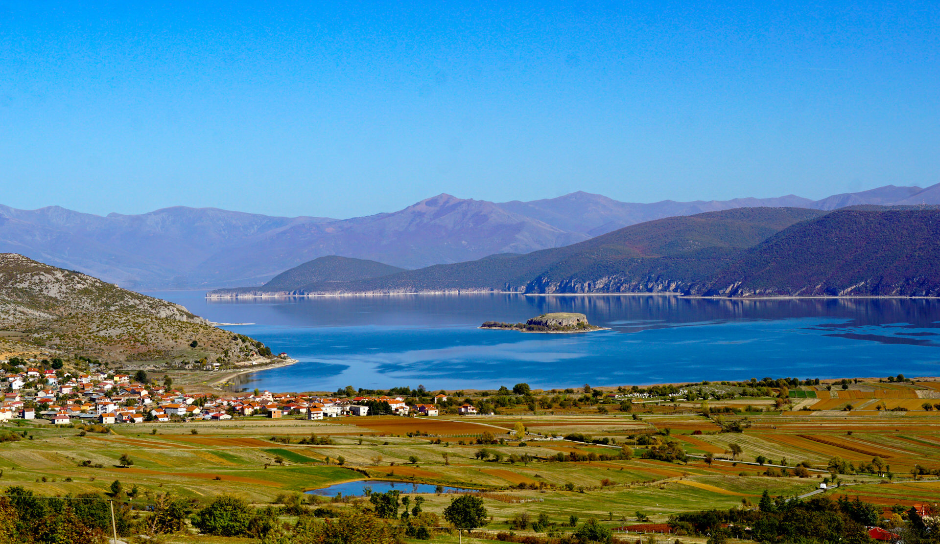 Lake Prespa serene waters with mountain backdrop
