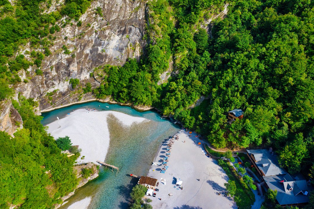 Shala River crystal clear turquoise waters surrounded by mountains