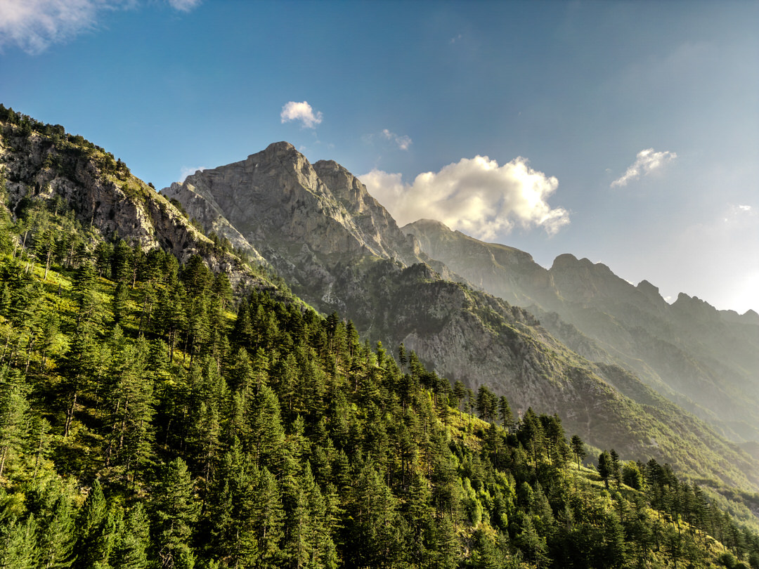 Valbona Accursed Mountains majestic peaks towering above valley